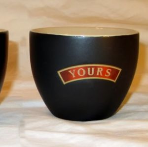 Pair of Bailey's "yours" and "mine" cups